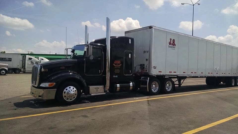 JS Transportation truck on the road