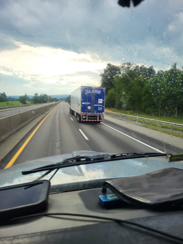 Dedicated trucking services Kansas City fleet on highway